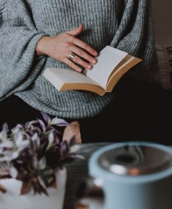 person holding an open book